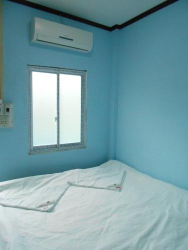 Postel nebo postele na pokoji v ubytování Lucky Backpacker Hostel