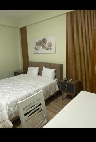 Ein Bett oder Betten in einem Zimmer der Unterkunft Villa Elear