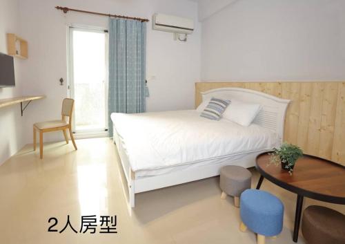 Katil atau katil-katil dalam bilik di Xiaodou B&B