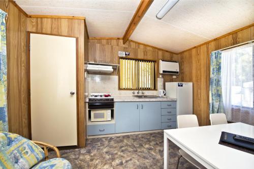 A kitchen or kitchenette at Albany Holiday Park