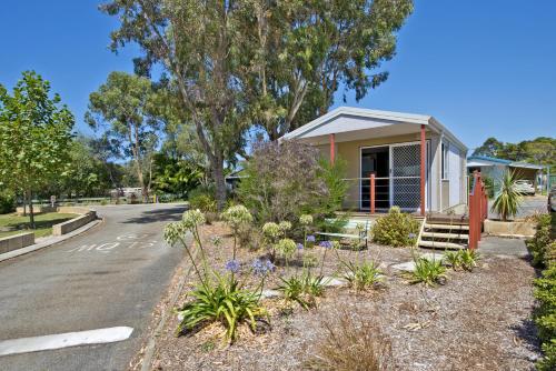 a house on the side of a road at Albany Holiday Park in Albany