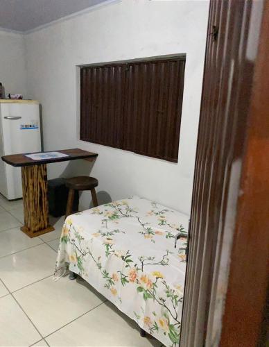 Katil atau katil-katil dalam bilik di Pousada Sitio do Terrão a 500 metros da BR 040 e a 10 minutos da Prainha