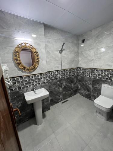 Koupelna v ubytování MİRHAN HOTEL