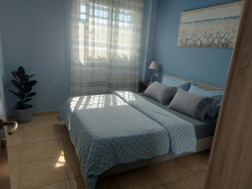 เตียงในห้องที่ Ulmus Suite