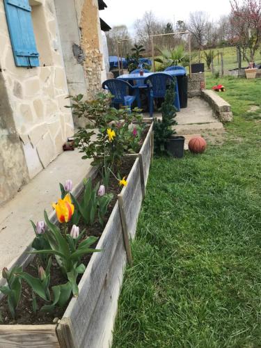 Taman di luar Chambres chez l'habitant Bambou et Musique cuisine et sdb partagées