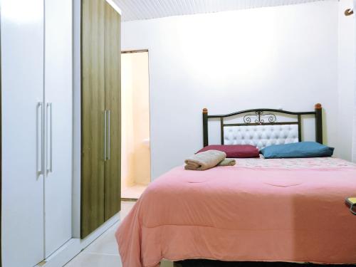 Katil atau katil-katil dalam bilik di Casa Excelente Localização!