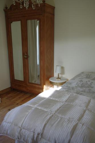 Ένα ή περισσότερα κρεβάτια σε δωμάτιο στο Le Clos des Camélias, 4 chambres- 8 personnes- 300m de la plage