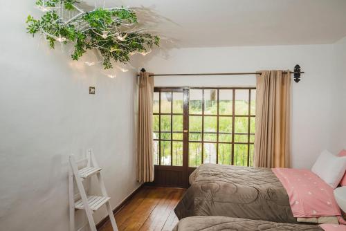 Ένα ή περισσότερα κρεβάτια σε δωμάτιο στο Inkas Hotel y convenciones