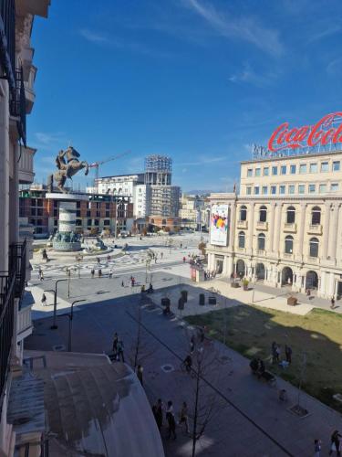 a view of a city square with a large building at Skopje Plaza Apartment in Skopje