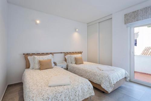 Ένα ή περισσότερα κρεβάτια σε δωμάτιο στο Villa Isabel