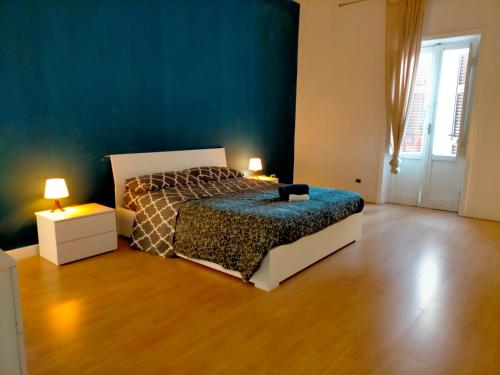 A bed or beds in a room at Brigante's home