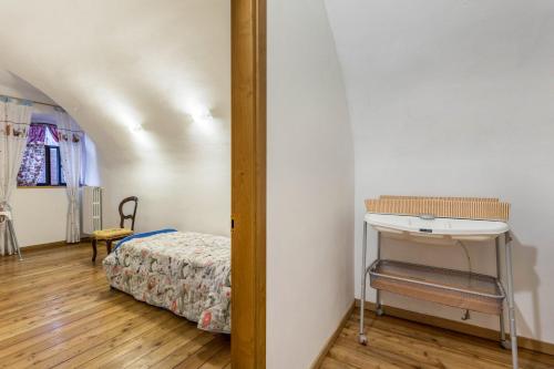 Кровать или кровати в номере Appartamento Luna