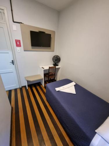 Una cama o camas en una habitación de Hotel Hermann