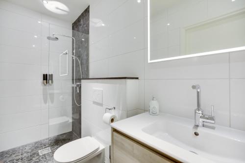 Ett badrum på Hotel Oranjestaete