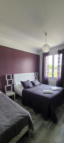 Postel nebo postele na pokoji v ubytování Hôtel l'Etoile