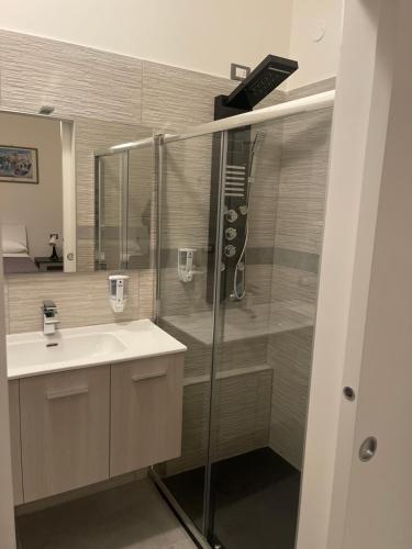 a bathroom with a shower and a sink at B&B UN POSTO AL MARE San Salvo Marina in San Salvo