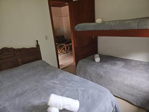 Ένα ή περισσότερα κρεβάτια σε δωμάτιο στο LarDoceFesta Home