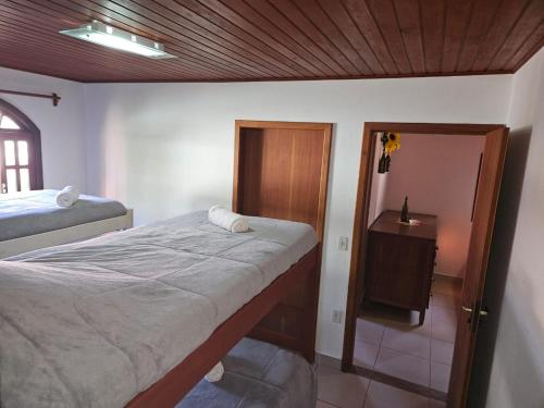 Ένα ή περισσότερα κρεβάτια σε δωμάτιο στο LarDoceFesta Home