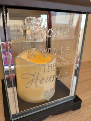 a glass display with a cake in a glass case at Seawick Holiday Park in Saint Osyth