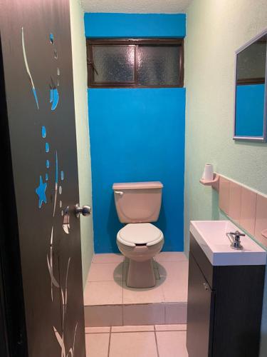 Ένα μπάνιο στο Alojamiento Vacacional Casa Conchalito