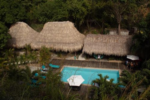 an aerial view of a resort with a swimming pool at Hotel Isabella Tayrona in Los Naranjos