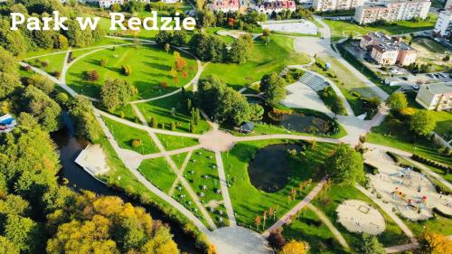 an aerial view of a park in a city at Apartament 44 Aquapark Reda in Reda