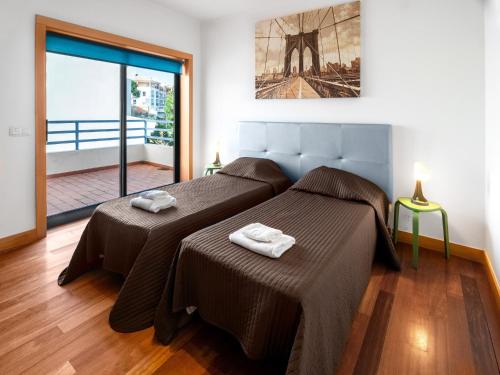 Ένα ή περισσότερα κρεβάτια σε δωμάτιο στο LINDA Oura Beach 4BR Villa 10 New for rent!