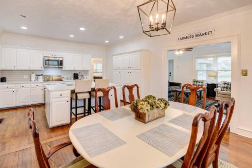 a kitchen and dining room with a table and chairs at 2 Mi to Dtwn Waco Home with Shared Yard! in Waco