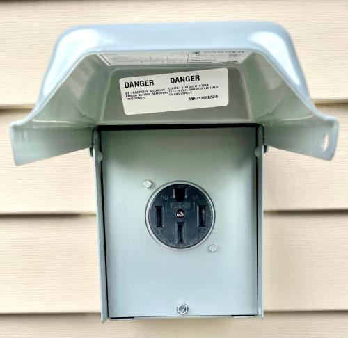a danger danger mailbox with a danger danger sticker on it at Sooke Vacation suite in Sooke