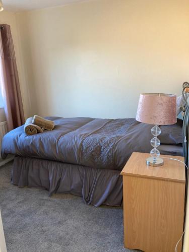 Ένα ή περισσότερα κρεβάτια σε δωμάτιο στο Tempest House 3 bedroom