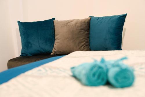 מיטה או מיטות בחדר ב-Corfu PRIME Apartments