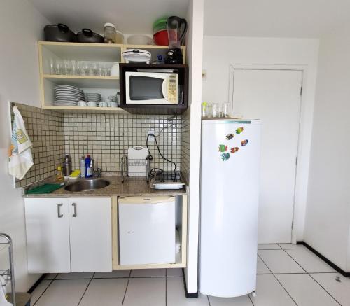 Kuchyň nebo kuchyňský kout v ubytování GRAN LENÇÓIS FLAT RESIDENCE
