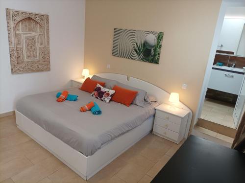 Postel nebo postele na pokoji v ubytování La Villa Calypso - Vivienda Vacacional con Piscina Privada