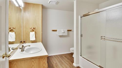 a bathroom with a sink and a shower at Wallowa 10 in Sunriver