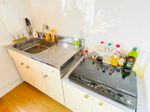 AKARIYA Hostelにあるキッチンまたは簡易キッチン