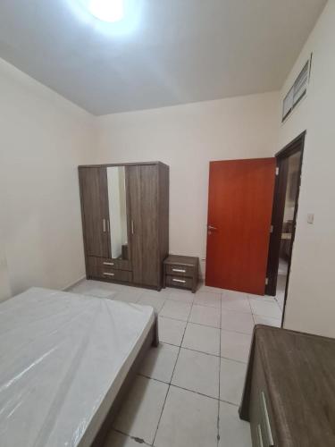 Llit o llits en una habitació de Almond Tower A5