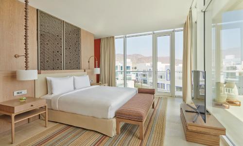 Postel nebo postele na pokoji v ubytování Hyatt Regency Aqaba Ayla Resort