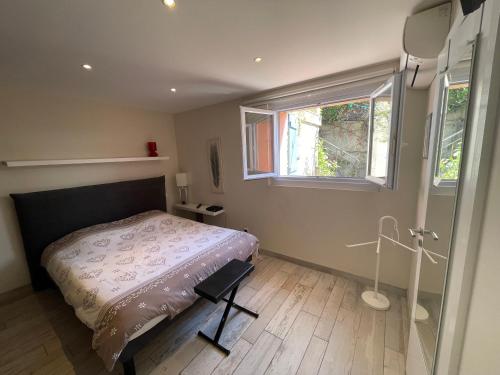 Posteľ alebo postele v izbe v ubytovaní Appartement Les Moulins