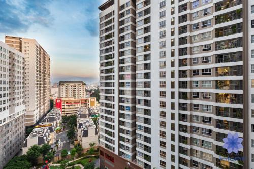 an aerial view of tall buildings in a city at Apartments near Tân Sân Nhất Airpot in Ho Chi Minh City