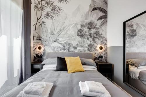 A bed or beds in a room at Classy Apt in the richest Rome