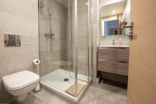 a bathroom with a shower and a toilet and a sink at JEAN MEDECIN - Modern and brand new 1Br flat in Nice