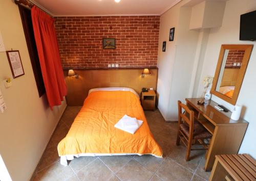 Ένα ή περισσότερα κρεβάτια σε δωμάτιο στο TARLAS ROOMS