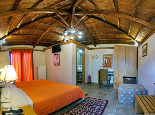 Ένα ή περισσότερα κρεβάτια σε δωμάτιο στο TARLAS ROOMS