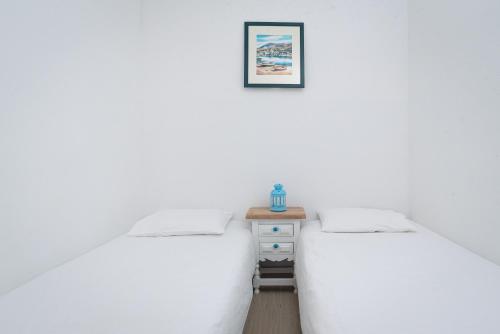 Katil atau katil-katil dalam bilik di Spondylus Apartment
