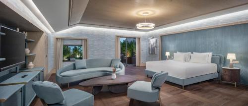 En eller flere senge i et værelse på Ela Excellence Resort Belek