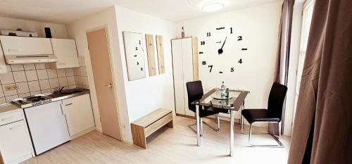 Η κουζίνα ή μικρή κουζίνα στο Apartments Pfannenstübchen