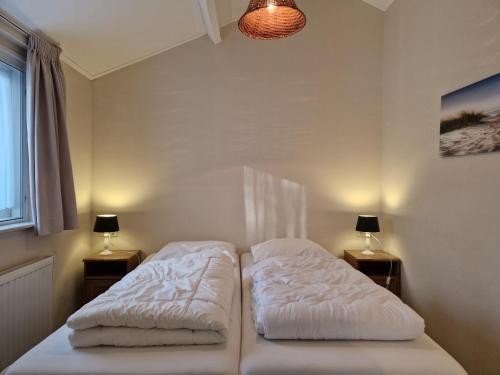 Ένα ή περισσότερα κρεβάτια σε δωμάτιο στο Vakantiewoning Vlier