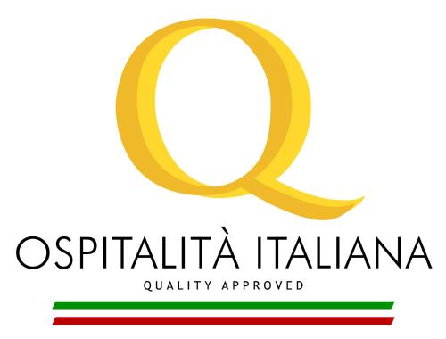 a letter q with the flag of ospritida italy and the inscription at Hotel Ayri in Medesano