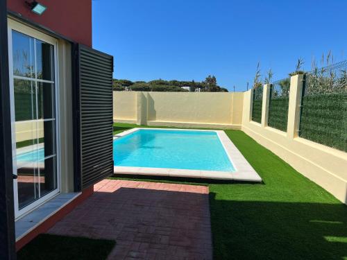 Casa piscina Playa Barrosa Delfin 6