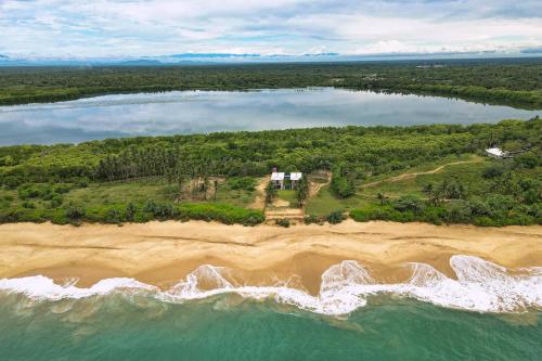 an aerial view of an island in a body of water at Sati Villa Rekawa Beach Sri Lanka in Tangalle